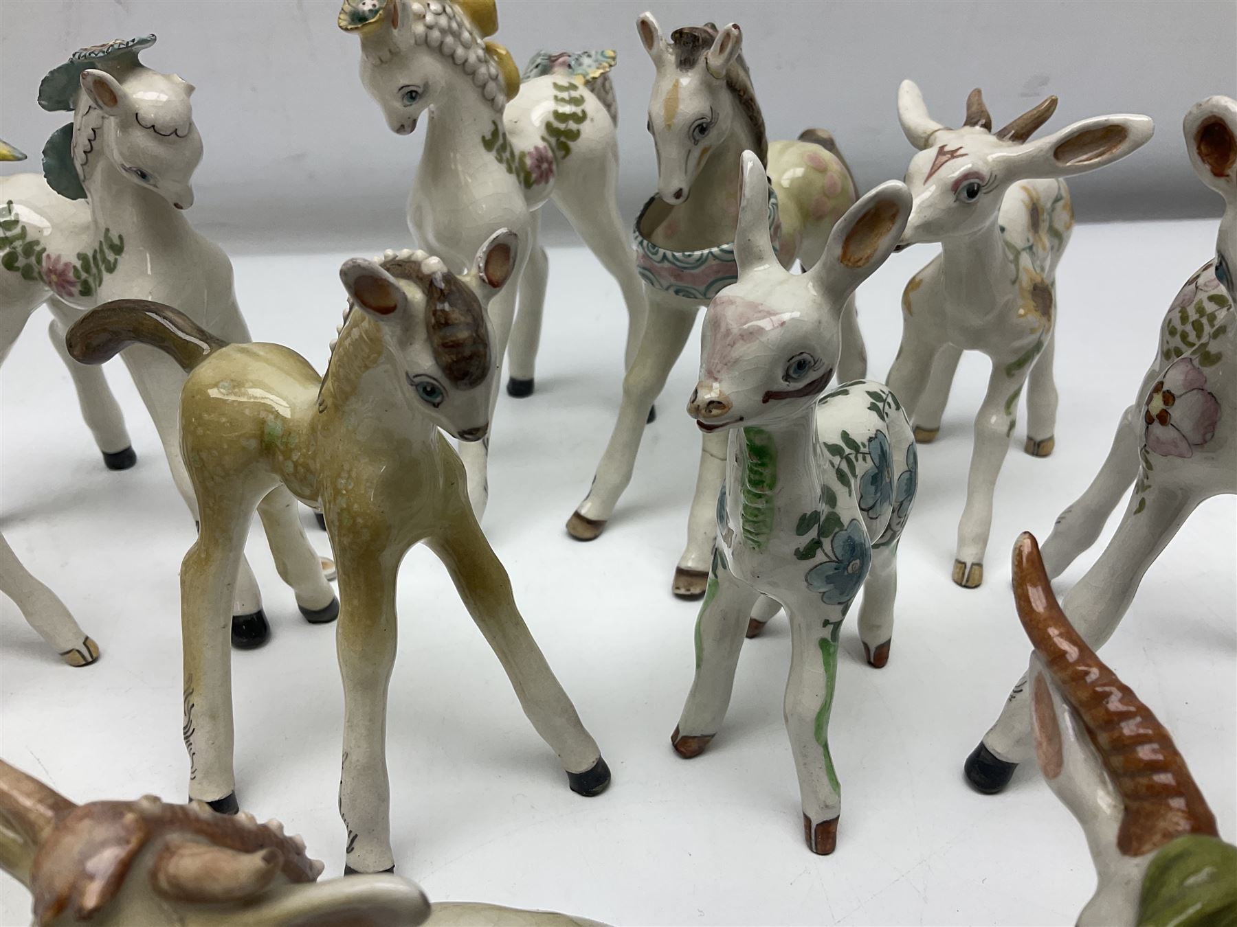 Basil Matthews figures, comprising horses, deer and fawns, all with painted mark beneath, largest H14cm