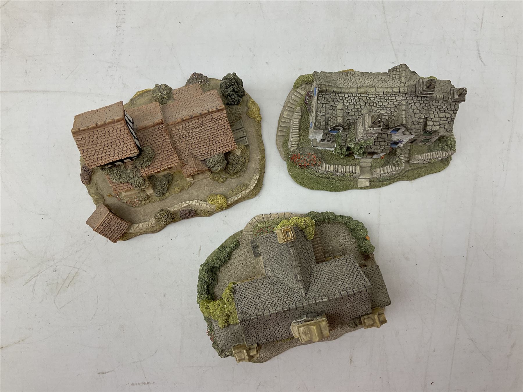 Eleven Lilliput Lane models, to include St Marks, Rose Cottage, Puffin Row, Village School, Swan Inn etc, all boxed