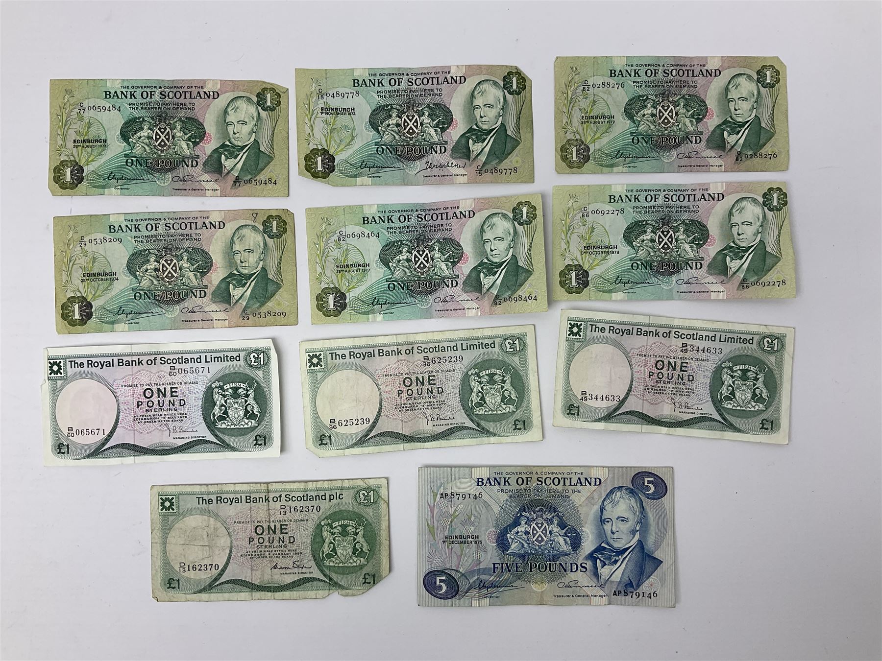 Banknotes including four Bank of England O'Brien one pound notes 'Y52J', 'T44J', 'T92J' and 'S23J', various ten shillings, two Somerset ten pounds 'CU20' and 'AW12', Page one pound notes, Bank of Scotland and other Scottish one pound notes etc
