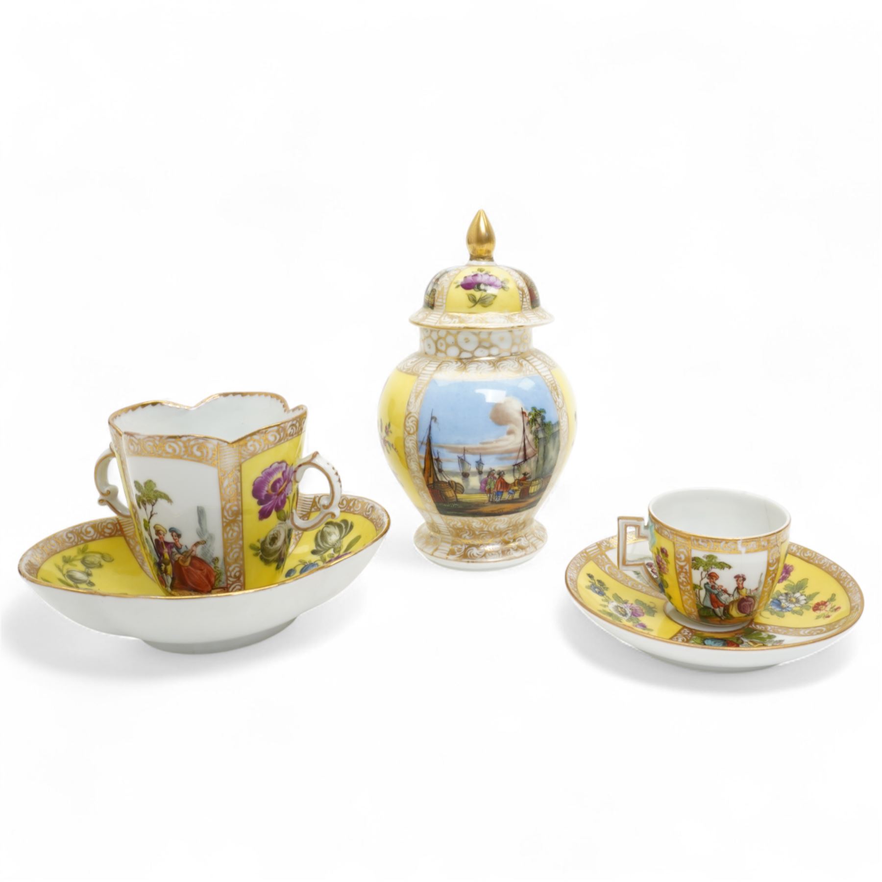 Helena Wolfsohn Dresden porcelain quatrefoil twin handled chocolate cup and stand, painted with panels of courting couples and floral sprays on a yellow ground, together with another Wolfsohn cup and saucer of the same design, and a similar continental vase decorated with shipping and town scenes, all marked to base, chocolate cup H8cm 