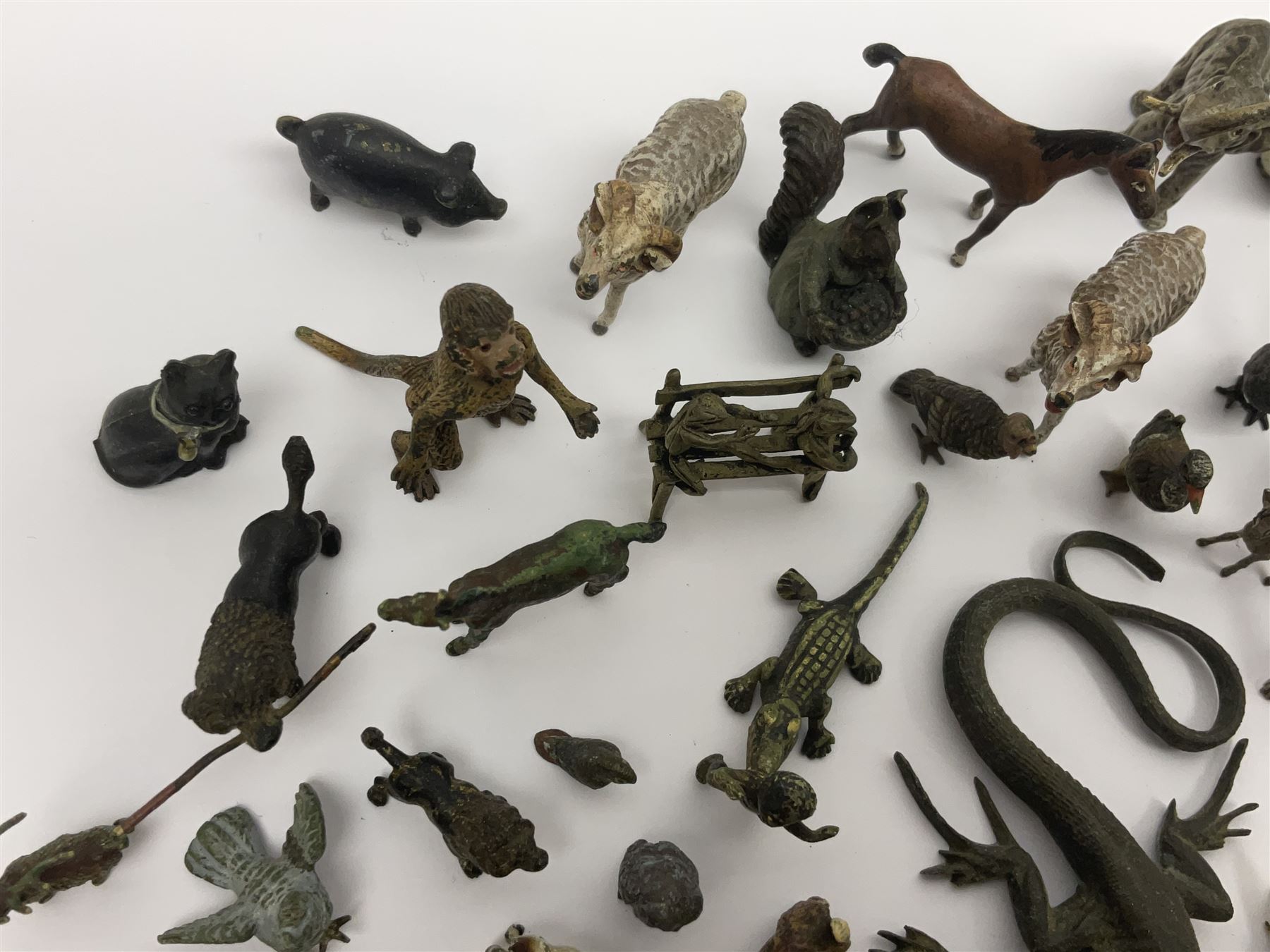 Collection of miniature cold painted bronze and similar animals, to include birds, sheep, horses etc 