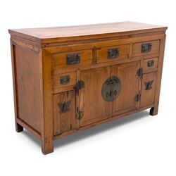Late 20th-century Thai elm sideboard fitted with an arrangement of three drawers over a ce...