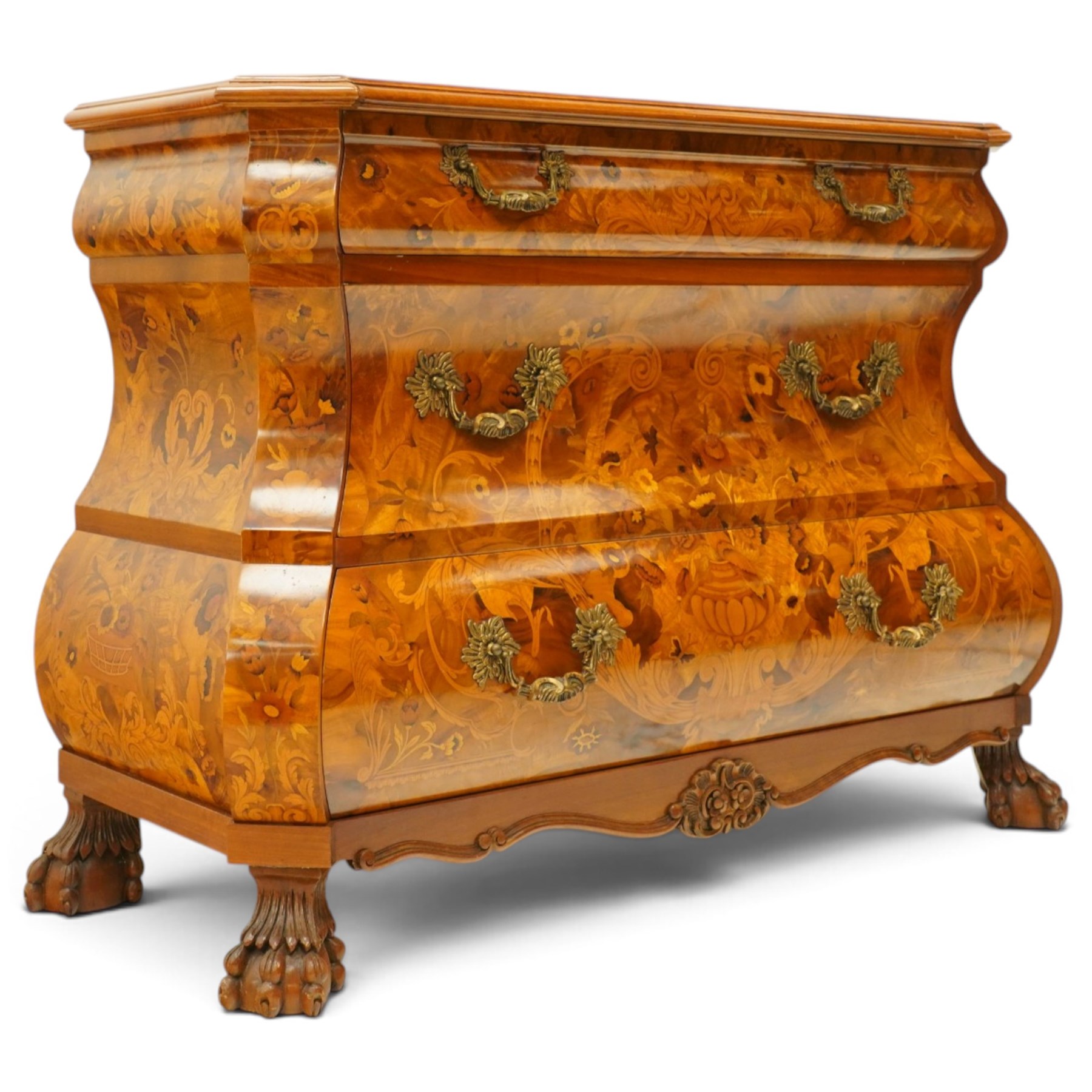 Colombo Mobili - Italian walnut and floral marquetry bombé commode chest, rectangular top with canted eared corners inlaid with urn motif and trailing scrolling foliage, fitted with three long graduating drawers with gilt metal handles, profusely inlaid with scrolling acanthus leaves interspersed with urns and cartouches, on large carved ball-and-claw feet
