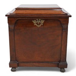 William IV mahogany cellarette, the rectangular hinged sarcophagus top enclosing bottle dividers and metal liner, the front applied with flanking flat pilasters, fitted with pressed brass handle plates escutcheon, lower moulded edge over brass hairy paw feet