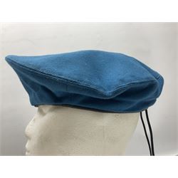 Four paratrooper berets - Russian, Italian, British and Foreign Legion; all with badges (4)