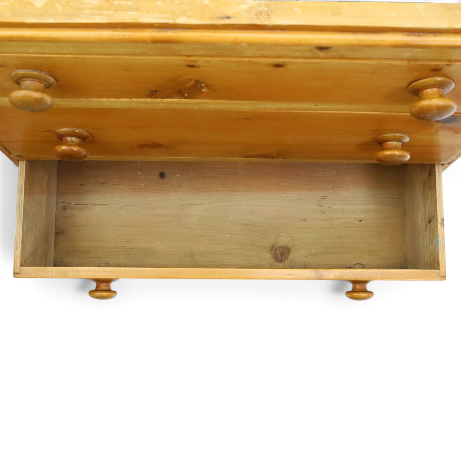 Two pine chests, comprising Victorian pine chest fitted with three  drawers with turned handles, shaped uprights extending to bracket feet, (H 83cm, W 77cm, D 41cm) and Continental pine chest fitted with three drawers with turned handles, on turned feet (H 81cm, W 100cm, D 51cm)