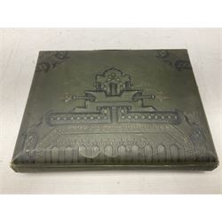 Victorian desk ink blotter, decorated with painted spray of flowers within stylised gilt rococo spandrels with mother of pearl fixings, together with a Victorian photo album containing interior leaves with apertures of various sizes and shapes of portraits surrounded by printed sea and dock scenes, blotter L28cm
