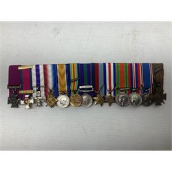 Captain (later Brigadier) Percy Howard Hansen V.C., D.S.O., M.C. 6th (Service) Battalion Lincolnshire Regiment - representative group of thirteen miniature dress medals comprising VC, DSO, MC, WW1 trio, GSM with Palestine clasp, four WW2 medals/stars, George VI Coronation Medal and French Croix-De-Guerre with MID leaves; all with ribbons on pinned bar for wearing; together with display of contemporary tunic ribbon bars for eight medals, framed with Lincolnshire Regiment cap badge, newspaper cutting and London Gazette extract; framed head and shoulder portrait of Hansen in uniform clearly showing his medal bars; and copies of related biographical information. Auctioneer's Note: Extract from the London Gazette 1st October 1915 regarding the VC 'For most conspicuous bravery on the 9th August 1915, at YILGHIN BURNU Gallipoli Peninsular. After the second capture of the 