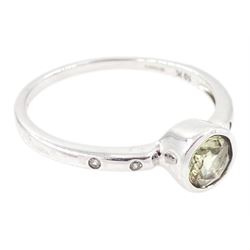 9ct white gold csarite and diamond ring, single round cut csarite with two rubover set diamonds set either side, Birmingham 2016