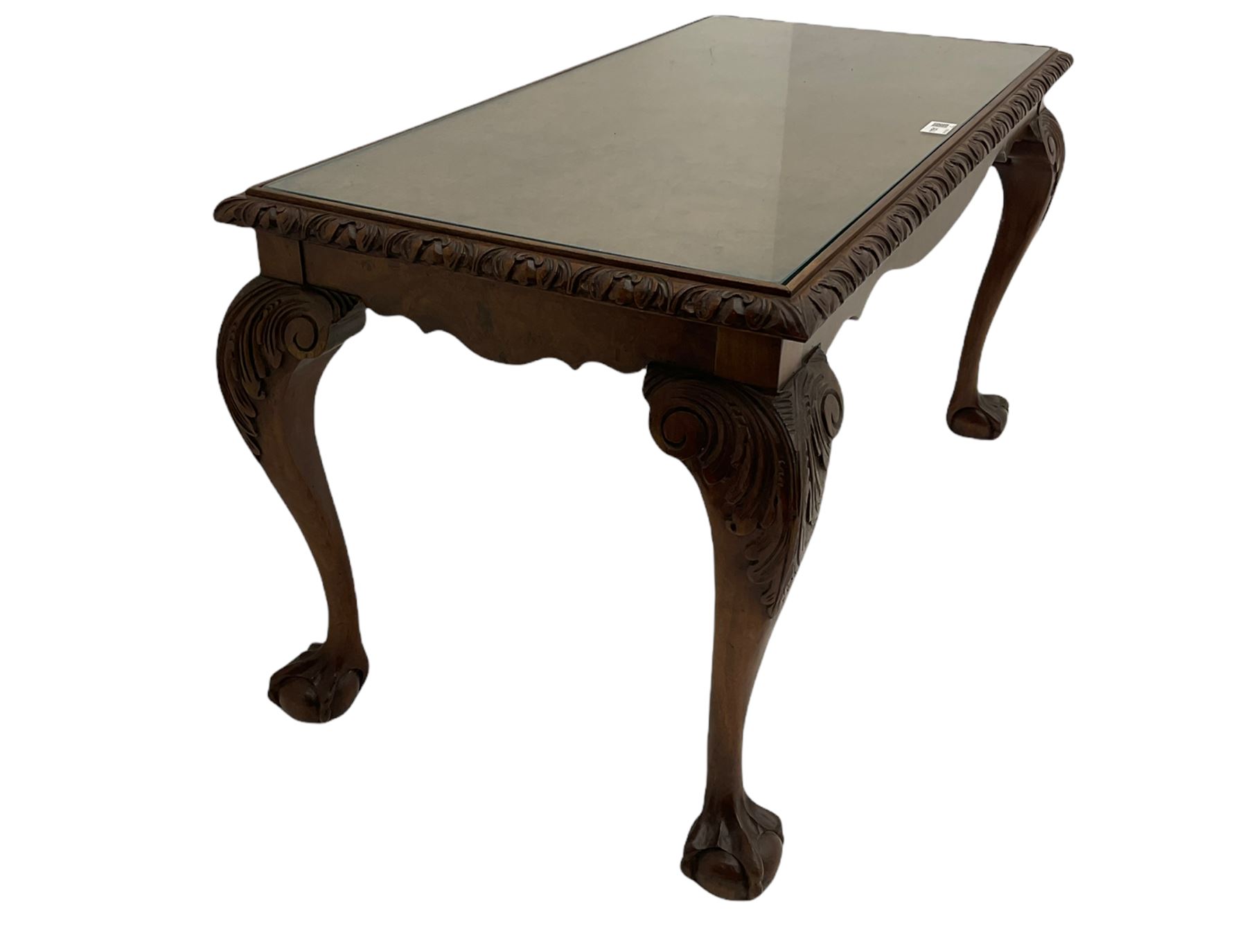 Mid 20th century figured walnut rectangular coffee table, inset glass