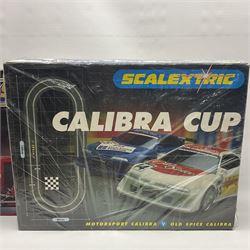 Scalextric - Scalextric 400 C587 set with March Ford 721 and JPS Formula One cars; Calibra Cup set with Motorsport Calibra and Old Spice Calibra; C8040 Track Extension Pack, Hump Back Bridge part-set and unassociated SuperSlot 1:32 scale die-cast Williams-Toyota FW29 unassembled car in four blister packs 