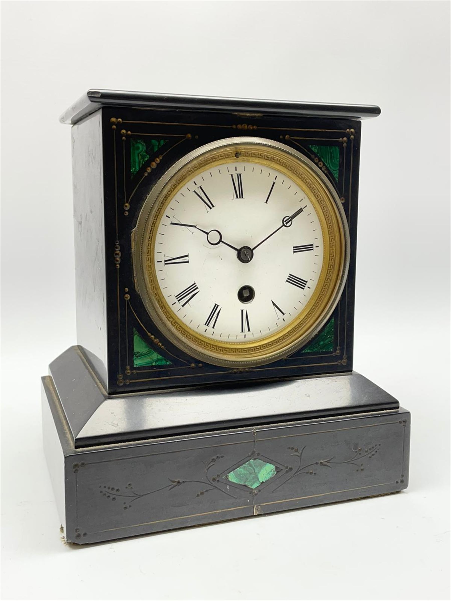 Victorian black slate mantel clock timepiece, the case with engraved and gilt decoration and inlaid with malachite, circular enamel Roman dial, single train driven movement