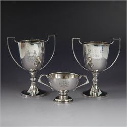 Pair of 1930s silver trophies, with angular handles and presentation engravings to body, h...