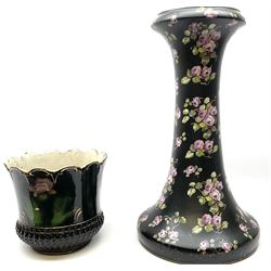 Jardiniere with gilt and floral decoration on a black ground, together with a similar plant stand with rose decoration. 
