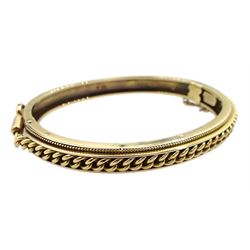 Early 20th century 15ct gold hinged bangle, with rope twist and bead decoration, makers mark J.A & S, Birmingham 1928 