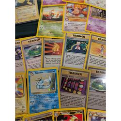 Collection of Pokemon TGC trading cards, including two WB First Movie Black Star promo cards Pikachu no. 4 and Dragonite no. 5, two Ancient Mew Black Star holo promo cards, Gym Challenge Giovanni's Persian 8/132 holo and a small collection WOTC, Neo Discovery and Neo Genesis cards, together with thirty four Bandai Carddass Pokemon cards, including prism Charizard no. 186 and Pokemon Topps cards including holo examples 