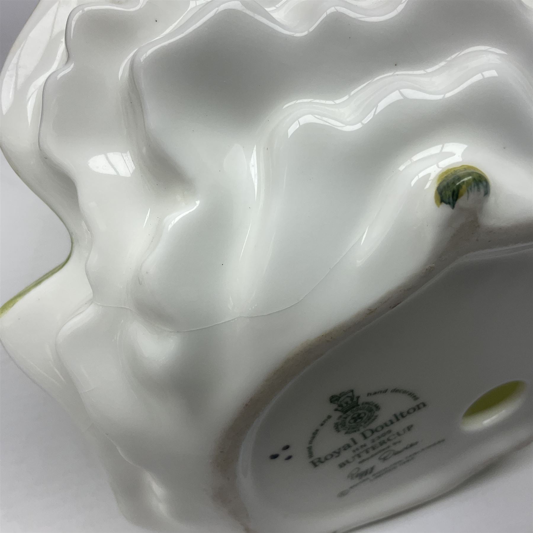 Two Royal Doulton figures, Buttercup HN2309 and Ascot HN2356, together with Capodimonte figure Hussar and His Lady 