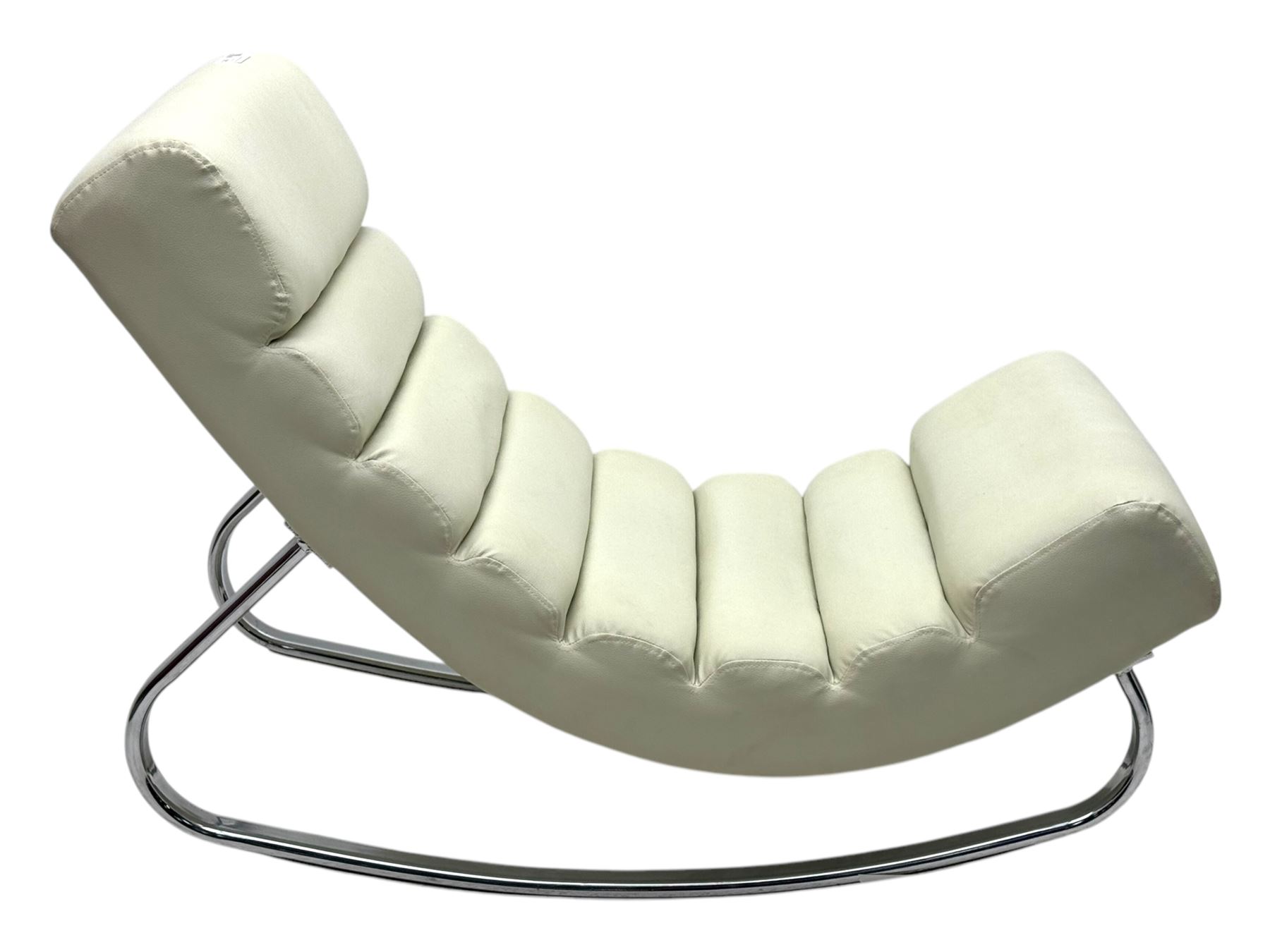 Cream leather modernist rocking chair, leather upholstery with horizontal channel stitching, supported by a chrome-plated tubular frame 