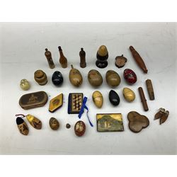Collection of wooden sewing accessories, to include olive wood pin cushion and needle holder, carved and painted thimble holders, needle cases etc