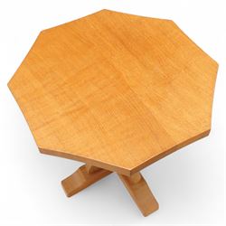 Mouseman - oak coffee table, octagonal adzed top on cruciform base and sledge feet, carved with mouse signature, by the workshop of Robert Thompson, Kilburn