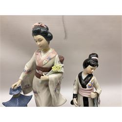 Two The Leonardo Collection figures of geisha women, together with five other oriental style figures