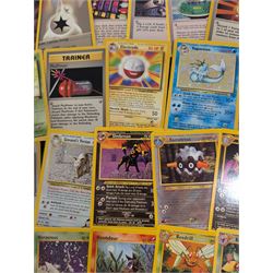 Collection of Pokemon TGC trading cards, including two WB First Movie Black Star promo cards Pikachu no. 4 and Dragonite no. 5, two Ancient Mew Black Star holo promo cards, Gym Challenge Giovanni's Persian 8/132 holo and a small collection WOTC, Neo Discovery and Neo Genesis cards, together with thirty four Bandai Carddass Pokemon cards, including prism Charizard no. 186 and Pokemon Topps cards including holo examples 