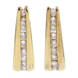 Pair of 9ct gold channel set diamond half hoop earrings, hallmarked