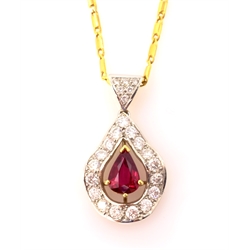  Pear shaped ruby and diamond 18ct white and yellow gold wavy pendant necklace, stamped 750 retailed Ogden Harrogate  