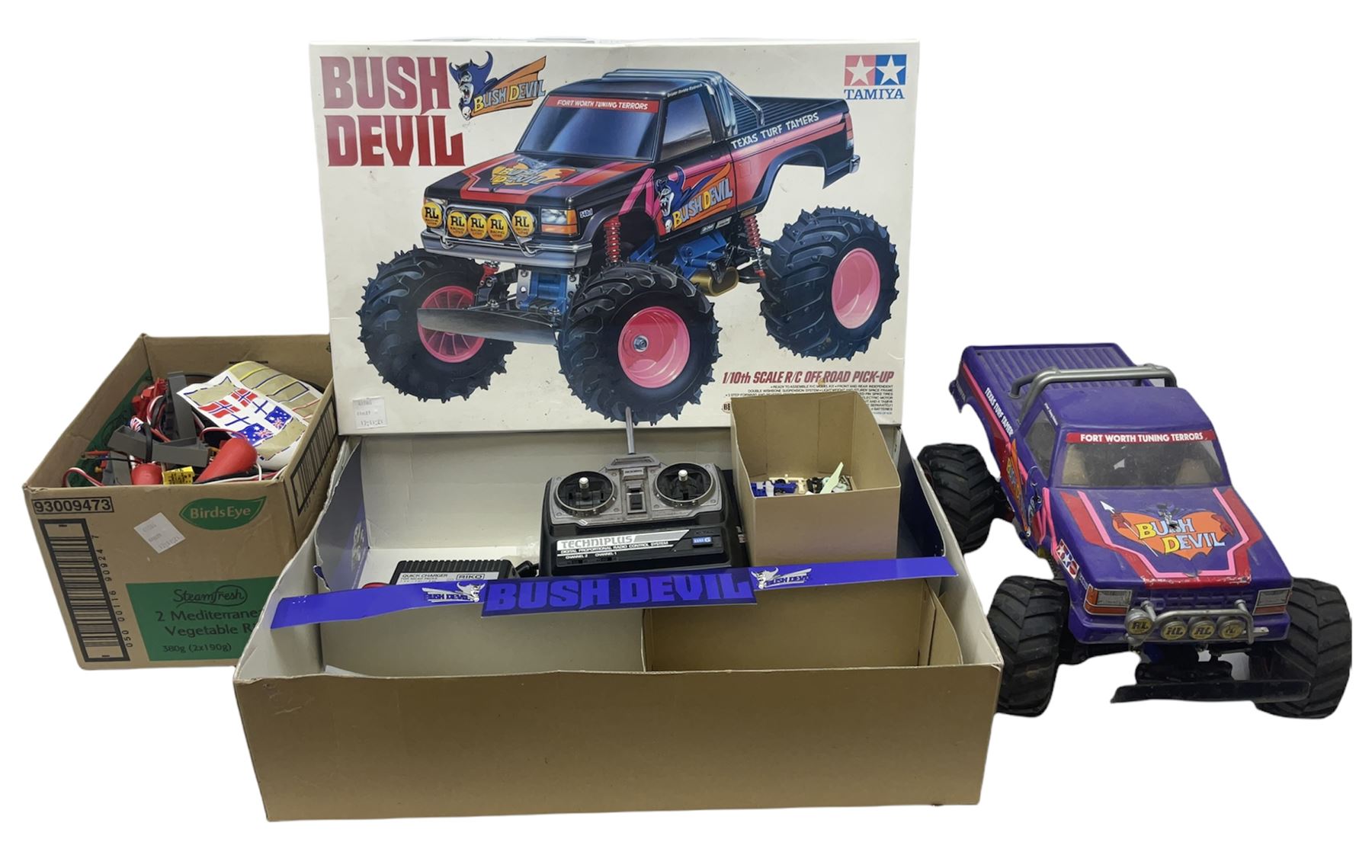Tamiya ' Bush Devil ' radio controlled truck, with original box, with radio gear and acoms transmitter, and a few accessories, untested