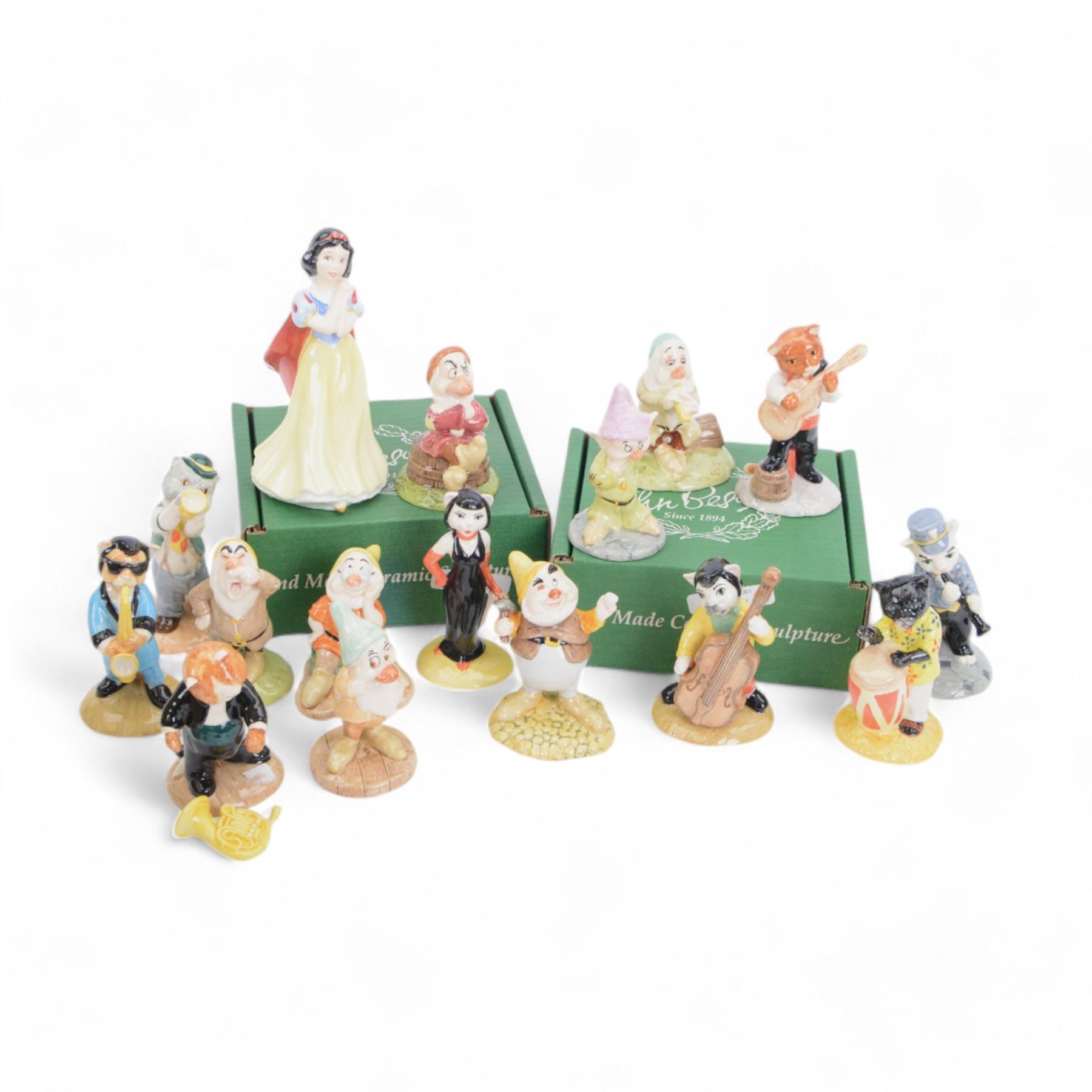 Royal Doulton figures Snow White and Seven Dwarfs, together with eight Beswick cat band figures, all with original boxes 