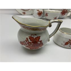 Herend Chinese Bouquet Rose pattern tea service comprising teapot, coffee pot, open sucrier, six cups and saucers, six tea plates, cream jug and stand, milk jug, two teabag holders, preserve pot, two leaf shaped dishes, four egg cups, salt & pepper pots, pair side plates and another plate