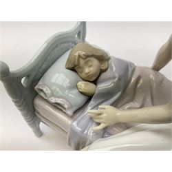 Lladro figure, Sleep Tight, modelled as a mother putting her daughter to bed, in original box, no 5900, year issued 1992, year retired 1997, H20cm