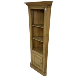 20th century pine floor-standing corner cupboard, fitted with shelves and panelled cupboard 