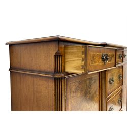 Georgian design figured walnut sideboard, moulded break-front crossbanded top over six drawers and two cupboards, highly figured door fronts, canted and fluted upright corners, on bracket feet