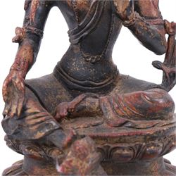 20th century bronzed buddha, with one hand raised, seated upon a lotus leaf, H27cm
