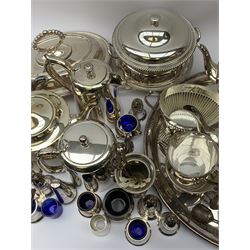 Mappin & Webb Art Deco style four-piece silver-plated tea set, a Mappin & Webb three-piece Princes Plate tea set of half fluted form with engraved monogram, two silver-plated entree dishes, circular tea tray, part cruets and other plated wares 