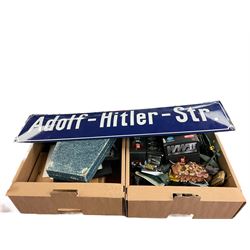 Collection of replica German WWII items, including solider figures, street sign etc, in three boxes 