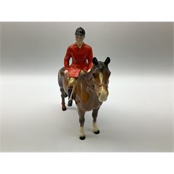 Beswick model of a huntswoman on grey horse model no 1730, and Beswick huntsman on brown horse model no 1501, both with printed mark beneath. 