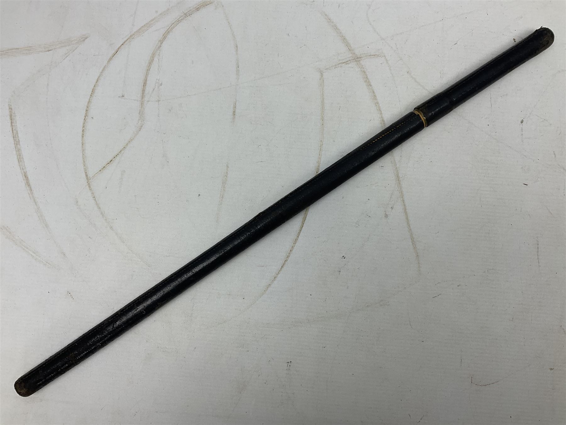 Early 20th century British Army Officer’s leather covered swagger / sword stick by Swaine & Adeney of 185 Piccadilly London; 34.5cm double edged spear point blade with etched foliate decoration and retailer’s details; stamped 'Forged in London' to the edge of the ricasso; L59.5cm overall