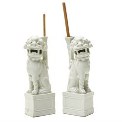 Pair of 19th century Chinese blanc de chine joss stick holders in the form of  Buddhist li...