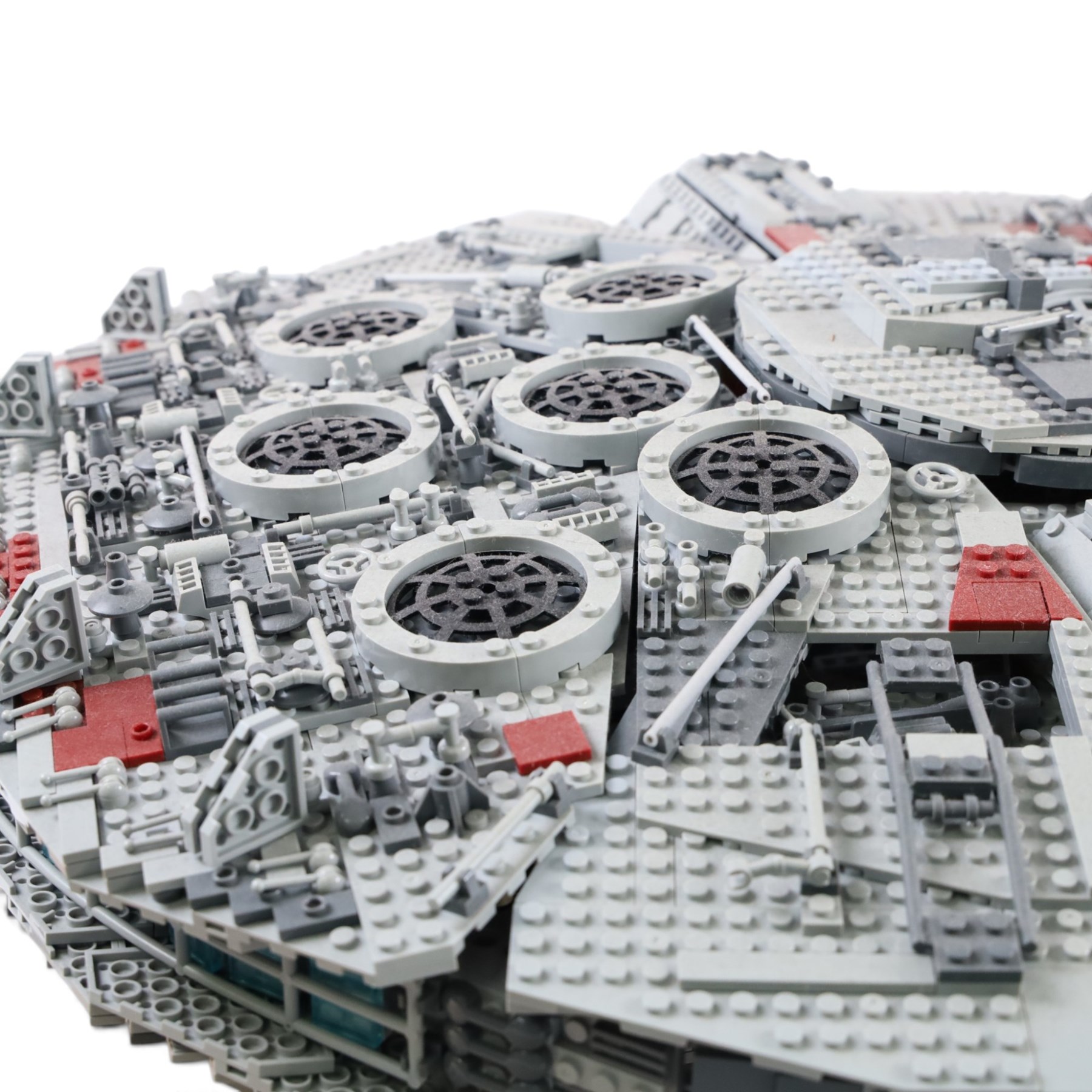 Three Lepin Star Wnrs built models, comprising Red Five X-Wing Starfighter no. 05039, Millennium Falcon no. 05132 and Super Star Destroyer no. 05028