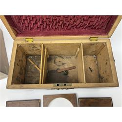 19th century burr yew wood tea caddy, of sarcophagus form, with strung details and brass mounts, the interior split into three compartments, upon four brass bun feet, together with an oak and brass bound writing slope, with red leather interior with gilt detailing, largest H16cm, W40cm