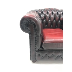  Chesterfield armchair upholstered in deep buttoned oxblood leather, W99cm  