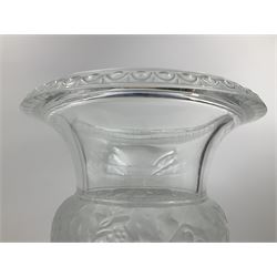 Large and impressive Lalique Versailles pattern glass vase, of classical baluster form with gadrooned flared rim, the body moulded in relief with fruiting vines above part fluting, upon a spreading circular foot with moulded decoration, and plain square plinth base, signed Lalique France to side of plinth, overall H35cm, with original box 