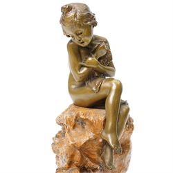 Attributed to Charlotte Monginot (French 1872-1934) - Bronze and marble figure of a child sitting on a rock ,a frog at her feet, signed H26cm x L19cm