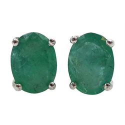 Pair of silver oval emerald stud earrings, stamped 925