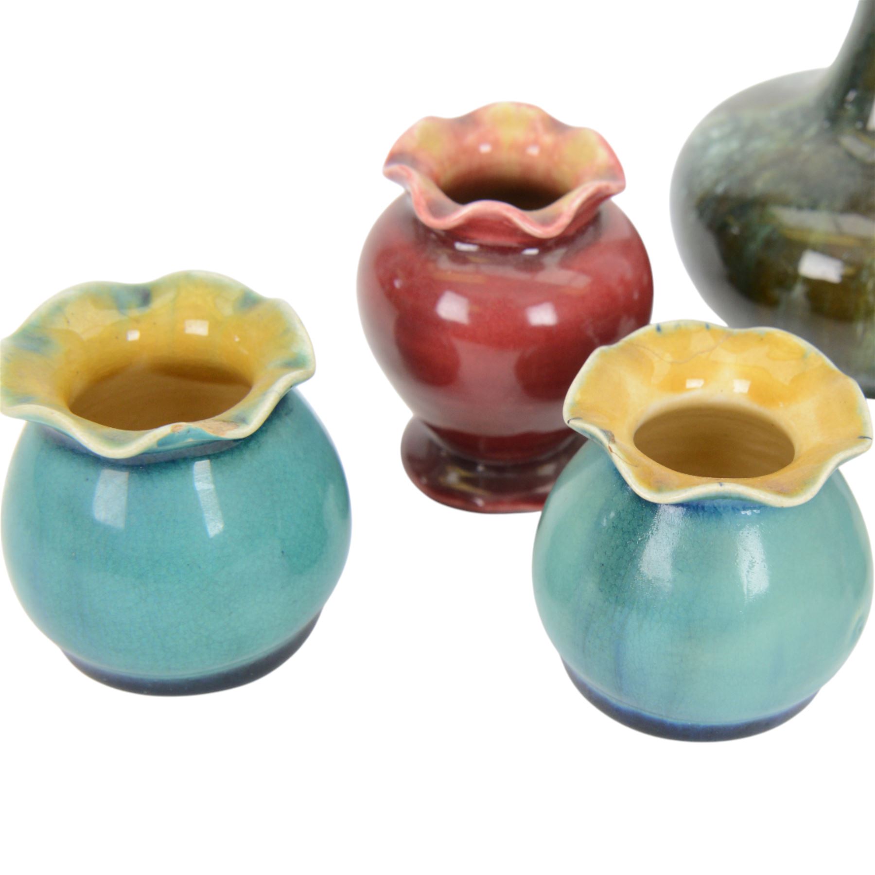 Collection of Linthorpe pottery vases, including pair of vases no 1558, tulip vase 1715 and six others  