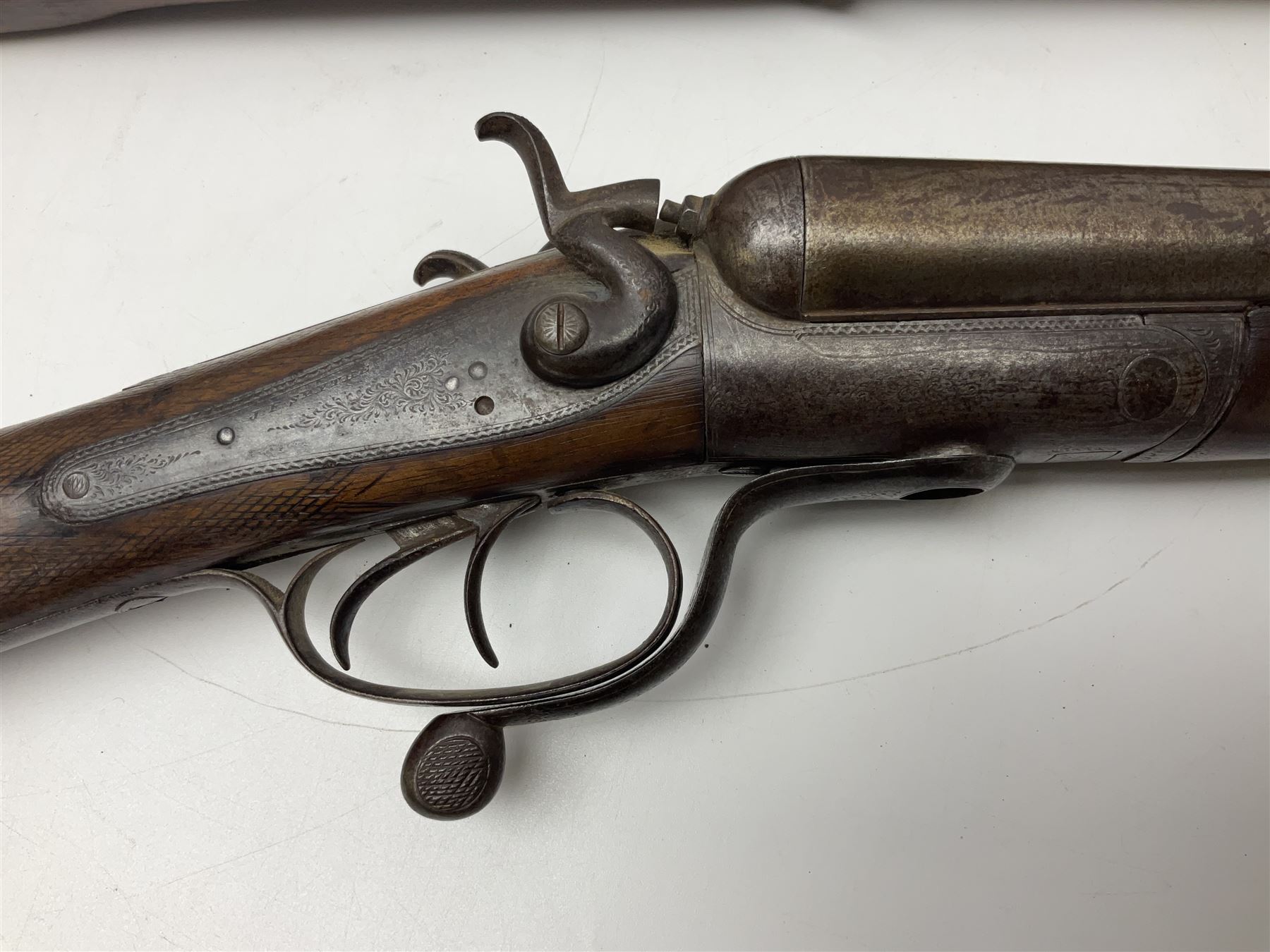 19th century Indian .577 Enfield muzzle loading rifle, proofed for 26-bore, the 98.5cm barrel with three barrel bands and later ram rod L140cm overall; 19th century Belgian side-by-side double barrel percussion shotgun, approximately 20-bore, with 74cm barrels and studded walnut stock, lock plate marked 'Liege 1868' and 'V. Gulikers-Maquinay' L117cm overall; and another side-by-side double barrel shotgun by Smythe with underlever opening (3)
