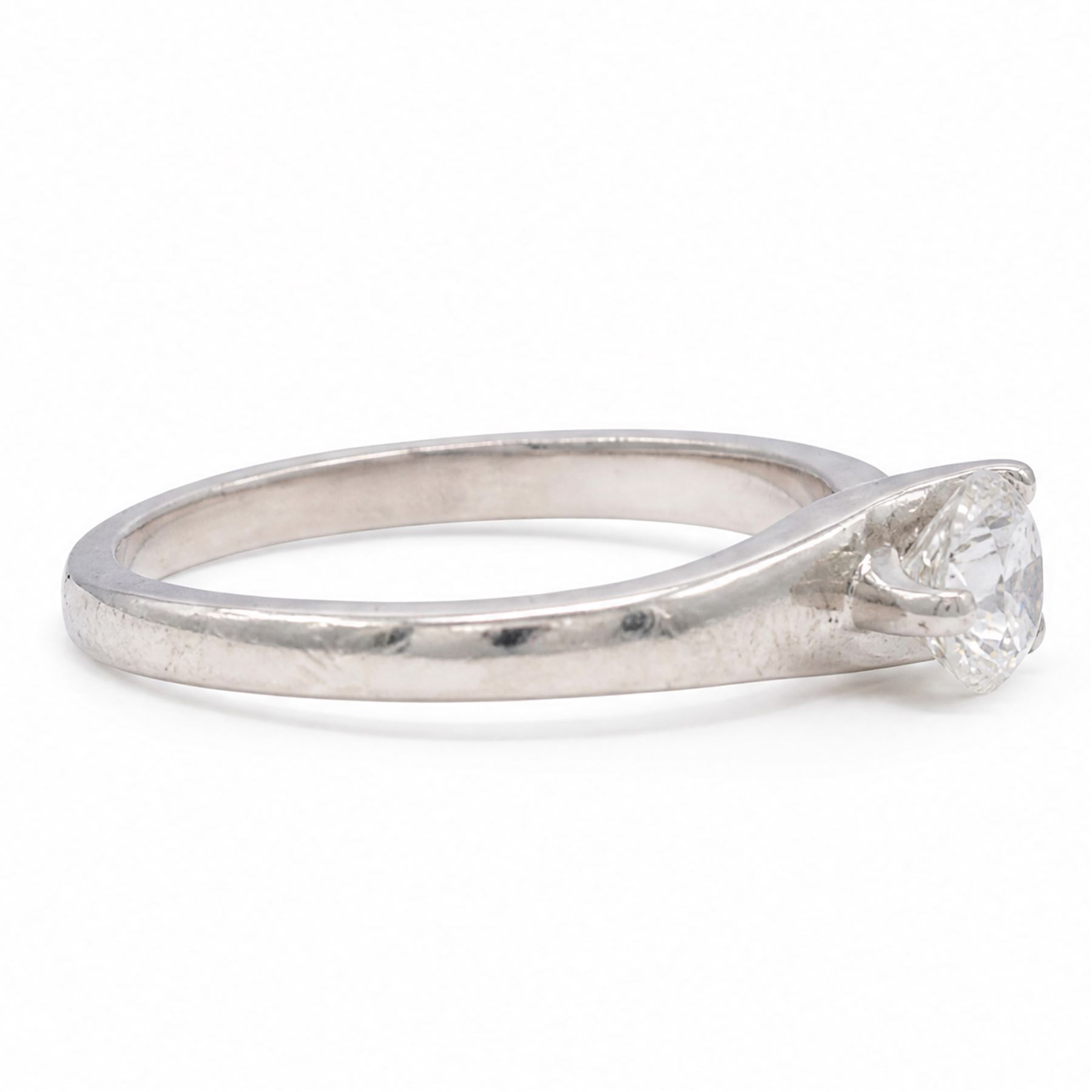 Platinum single stone diamond crossover ring, single round brilliant cut diamond of 0.50 carat, hallmarked