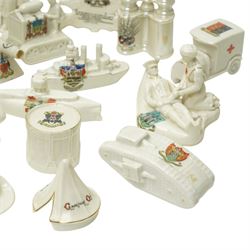 WW1 crested china including Grafton 'The Bomb thrower', Swan 'Nurse & Wounded Tommy', Model of Motor Tractor used on Western Front', two tanks, ambulance, Cenotaph etc